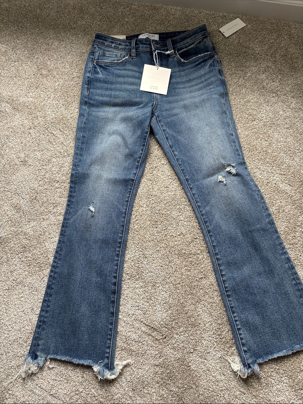 Women's Medium Blue Distressed Flare Jeans with Frayed Hem